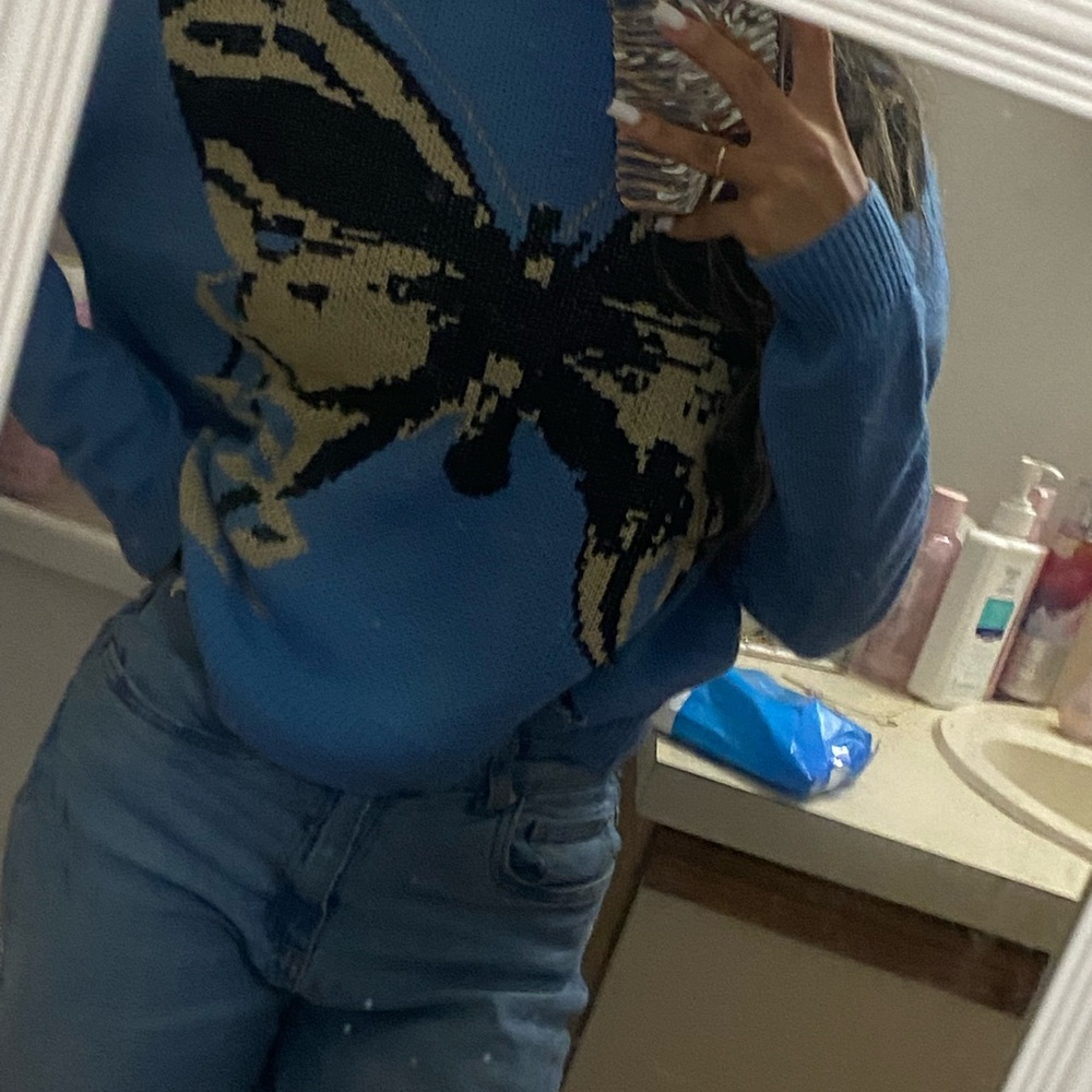 small blue knitted sweater; like new/never worn. open to lowering price :)